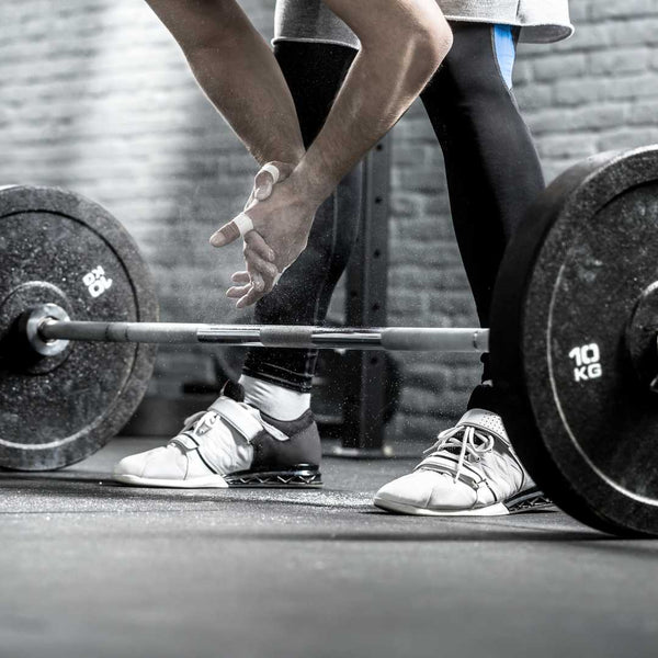 Olympic Barbell vs Standard Which Should You Choose? KLBFit