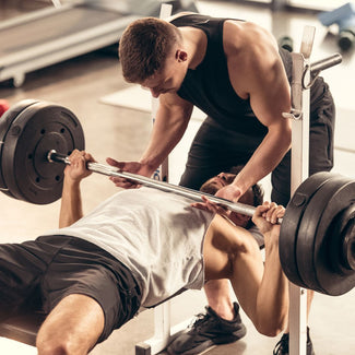 Lift More Weight Instantly! 4 Science-Backed Benefits of Training With a Partner